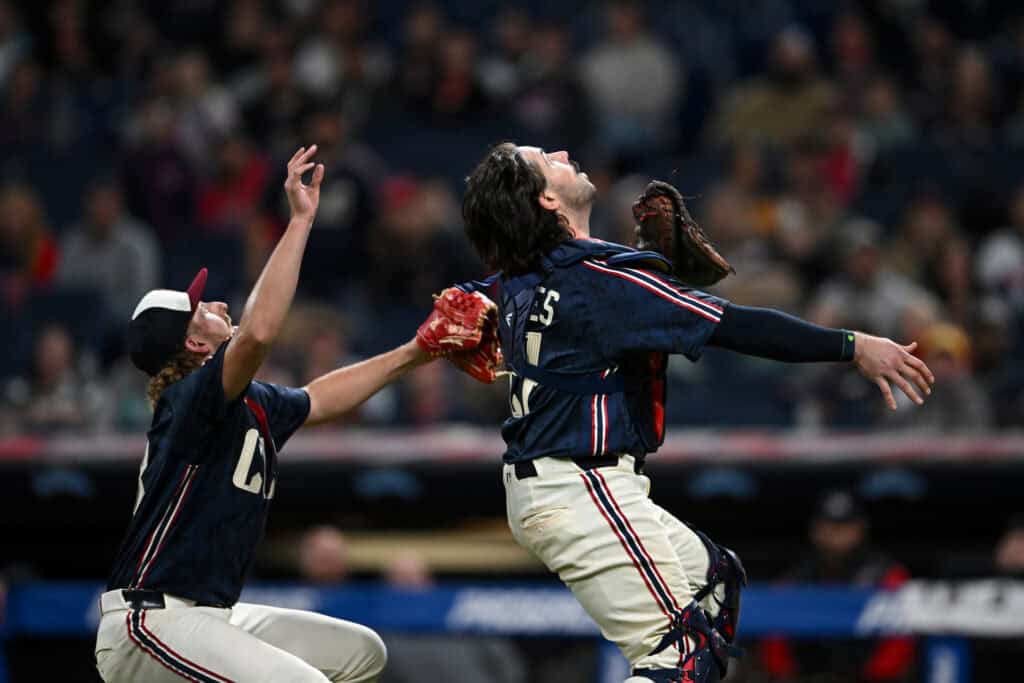 CLEVELAND, OHIO - MAY 09: Tanner Bibee #28 and Austin Hedges #27 of the Cleveland Guardians collide while fielding a pop fly ball hit by Brooks Lee of the Minnesota Twins during the sixth inning at Progressive Field on May 09, 2026 in Cleveland, Ohio