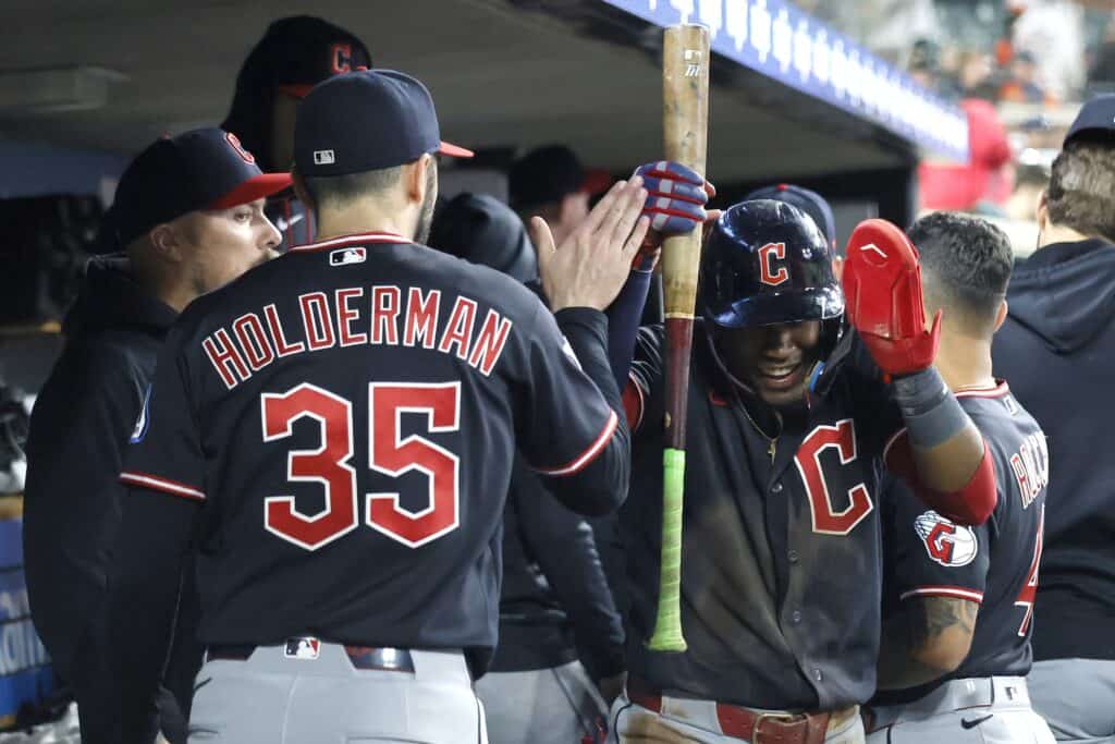 DETROIT, MI - MAY 20: Angel Martinez #1 of the Cleveland Guardians celebrates scoring with Colin Holderman #35 in the 10th inning against the Detroit Tigers at Comerica Park on May 20, 2026 in Detroit, Michigan.