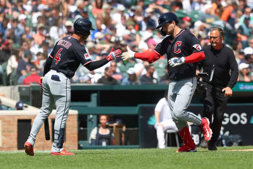 DETROIT, MICHIGAN - MAY 21: Patrick Bailey #16 of the Cleveland Guardians celebrates his eighth inning solo home run with Brayan Rocchio while playing the Detroit Tigers at Comerica Park on May 21, 2026 in