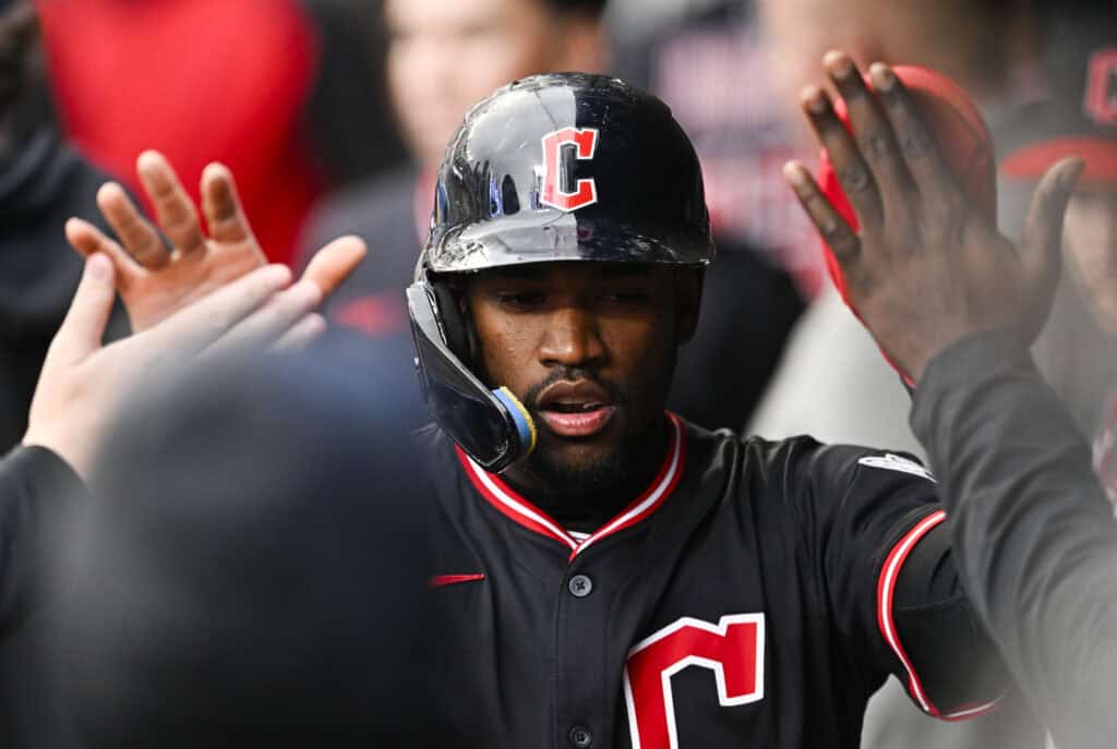 MINNEAPOLIS, MINNESOTA - MAY 19: Angel Martínez #1 of the Cleveland Guardians celebrates in the dugout after scoring a run in the first inning of the game against the Minnesota Twins at Target Field on May 19, 2025 in Minneapolis, Minnesota.