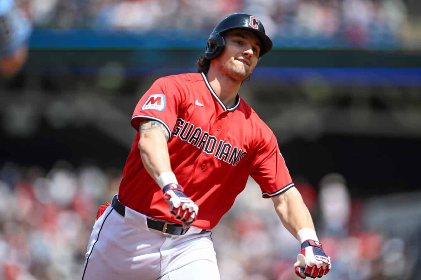 CLEVELAND, OHIO - MAY 17: Chase DeLauter #24 of the Cleveland Guardians celebrates after hitting a two-run home run during the first inning against the Cincinnati Reds at Progressive Field on May 17, 2026 in Cleveland, Ohio