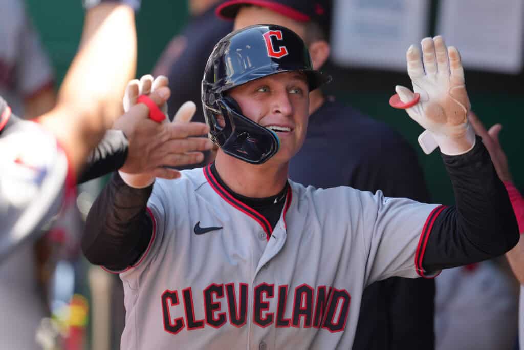 KANSAS CITY, MISSOURI - MAY 07: Petey Halpin #0 of the Cleveland Guardians celebrates with teammates after scoring in the sixth inning at Kauffman Stadium on May 07, 2026 in Kansas City, Missouri.