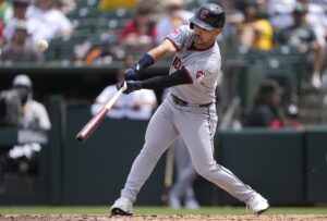 SACRAMENTO, CALIFORNIA - MAY 02: Steven Kwan #38 of the Cleveland Guardians hits an RBI single in the top of the fifth inning at Sutter Health Park on May 02, 2026 in Sacramento, California. Austin Hedges #27 scored on the play.
