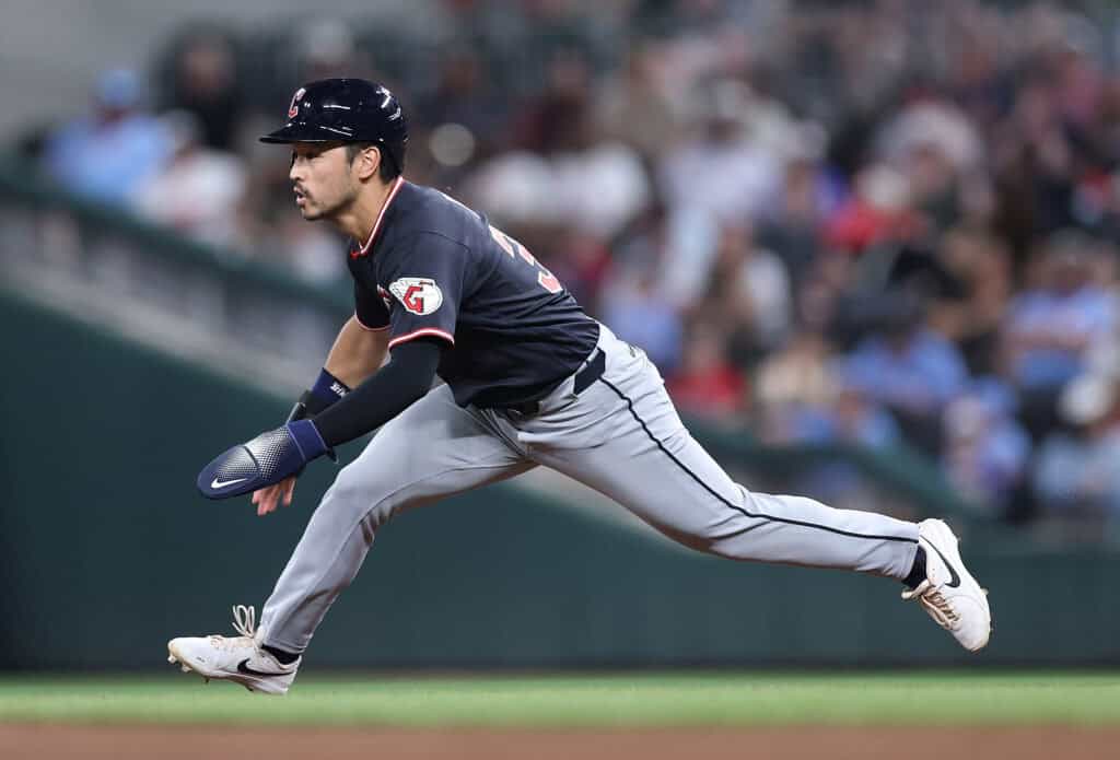 ATLANTA, GEORGIA - APRIL 11: Steven Kwan #38 of the Cleveland Guardians slides as he steals second base in the ninth inning against the Atlanta Braves at Truist Park on April 11, 2026 in Atlanta, Georgia.