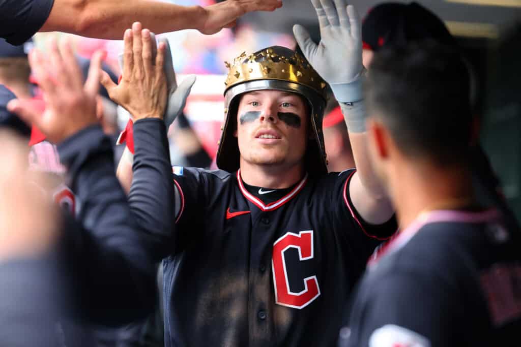PHILADELPHIA, PENNSYLVANIA - MAY 24: Travis Bazzana #37 of the Cleveland Guardians celebrates with teammates in the dugout after hitting a solo home run in the eighth inning during a game against the Philadelphia Phillies at Citizens Bank Park on May 24, 2026 in Philadelphia, Pennsylvania. The Guardians won 3-1.
