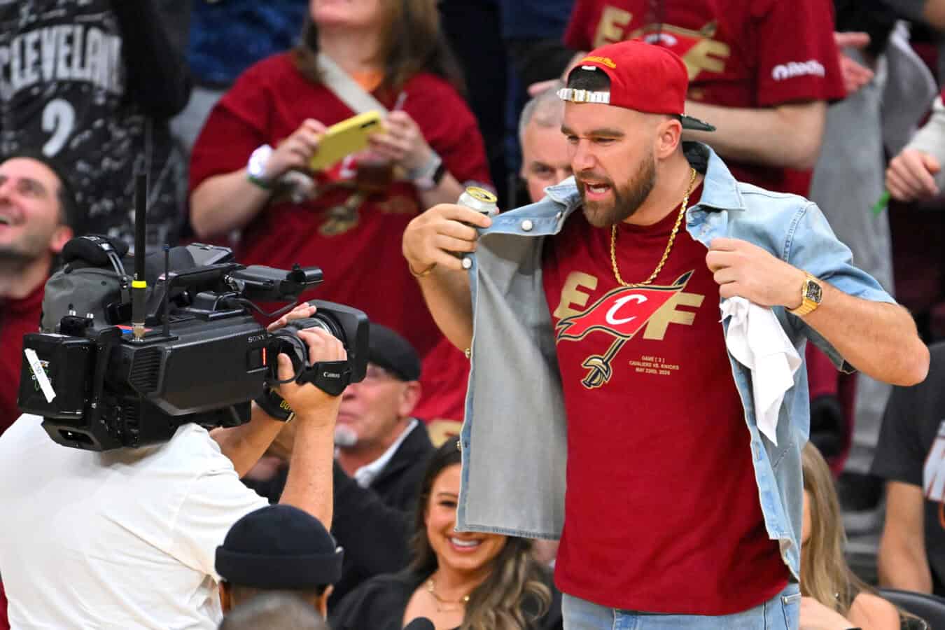 CLEVELAND, OHIO - MAY 23: Travis Kelce of the Kansas City Chiefs cheers during the third quarter in Game Three between the New York Knicks and the Cleveland Cavaliers in the NBA Eastern Conference Finals at Rocket Arena on May 23, 2026 in Cleveland, Ohio. NOTE TO USER: User expressly acknowledges and agrees that, by downloading and or using this photograph, User is consenting to the terms and conditions of the Getty Images License Agreement.