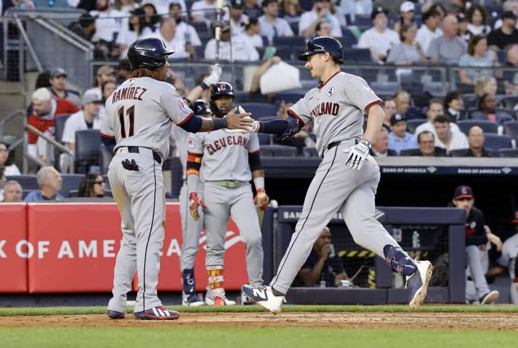 NEW YORK, NEW YORK - JUNE 02: Kyle Manzardo #9 of the Cleveland Guardians celebrates his fourth inning two run home run against the New York Yankees with teammate Jose Ramirez #11 at Yankee Stadium on June 02, 2026 in New York City. (