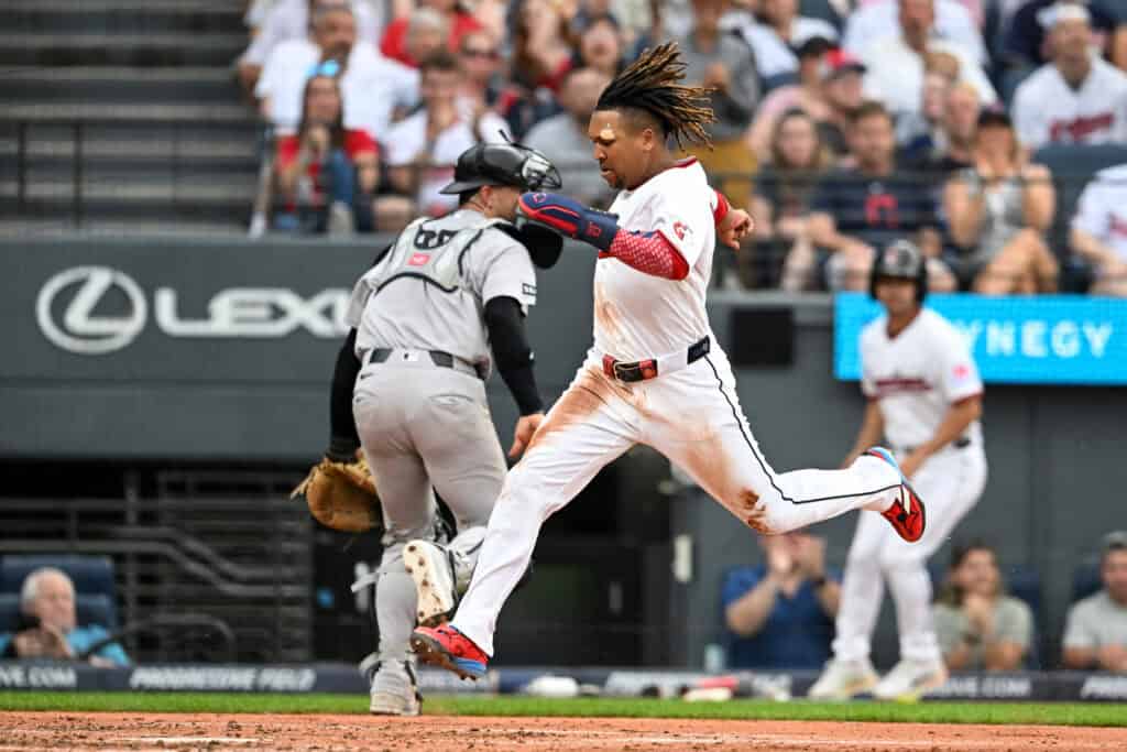 CLEVELAND, OHIO - JUNE 09: José Ramírez #11 of the Cleveland Guardians scores on a single that was hit by Chase DeLauter during the third inning against the New York Yankees at Progressive Field on June 09, 2026 in Cleveland, Ohio.