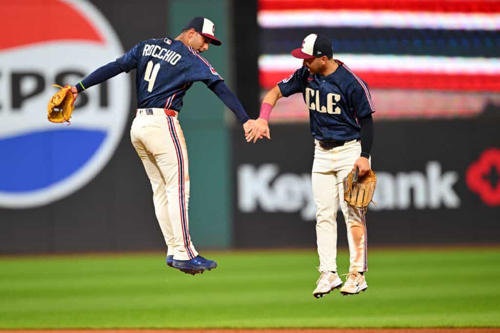 CLEVELAND, OHIO - JUNE 12: Brayan Rocchio #4 celebrates with Steven Kwan #38 of the Cleveland Guardians after the game against the Detroit Tigers at Progressive Field on June 12, 2026 in Cleveland, Ohio. The Guardians defeated the Tigers 3-2.