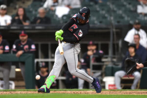CHICAGO, ILLINOIS - JUNE 24: Kahlil Watson #31 of the Cleveland Guardians hits an RBI during the tenth inning against the Chicago White Sox at Rate Field on June 24, 2026 in Chicago, Illinois.