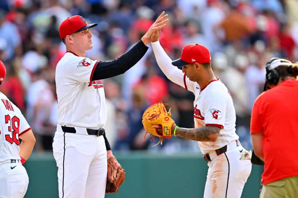 CLEVELAND, OHIO - JUNE 13: Closing pitcher Cade Smith #36 celebrates with Brayan Rocchio #4 of the Cleveland Guardians after the game against the Detroit Tigers at Progressive Field on June 13, 2026 in Cleveland, Ohio. The Guardians defeated the Tigers 3-1.