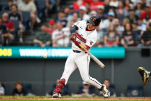 CLEVELAND, OHIO - JUNE 27: Cooper Ingle #30 of the Cleveland Guardians hits a two-run single for his first Major League base hit during the fourth inning against the Seattle Mariners at Progressive Field on June 27, 2026 in Cleveland, Ohio.