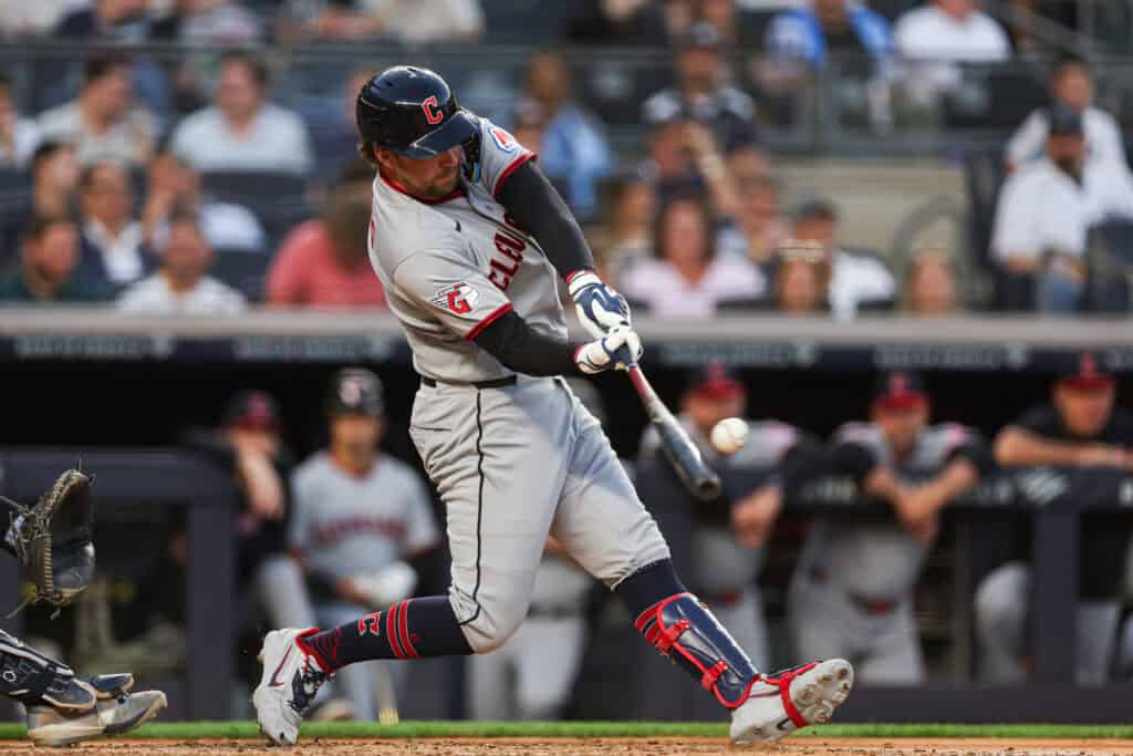 NEW YORK, NEW YORK - JUNE 03: Rhys Hoskins #8 of the Cleveland Guardians hits a two-run home run during the fourth inning against the New York Yankees at Yankee Stadium on June 03, 2026 in the Bronx borough of New York City.