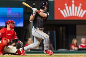 ARLINGTON, TEXAS - JUNE 05: Travis Bazzana #37 of the Cleveland Guardians follows through after hitting the ball during the fifth inning of a game against the Texas Rangers at Globe Life Field on June 05, 2026 in Arlington, Texas.