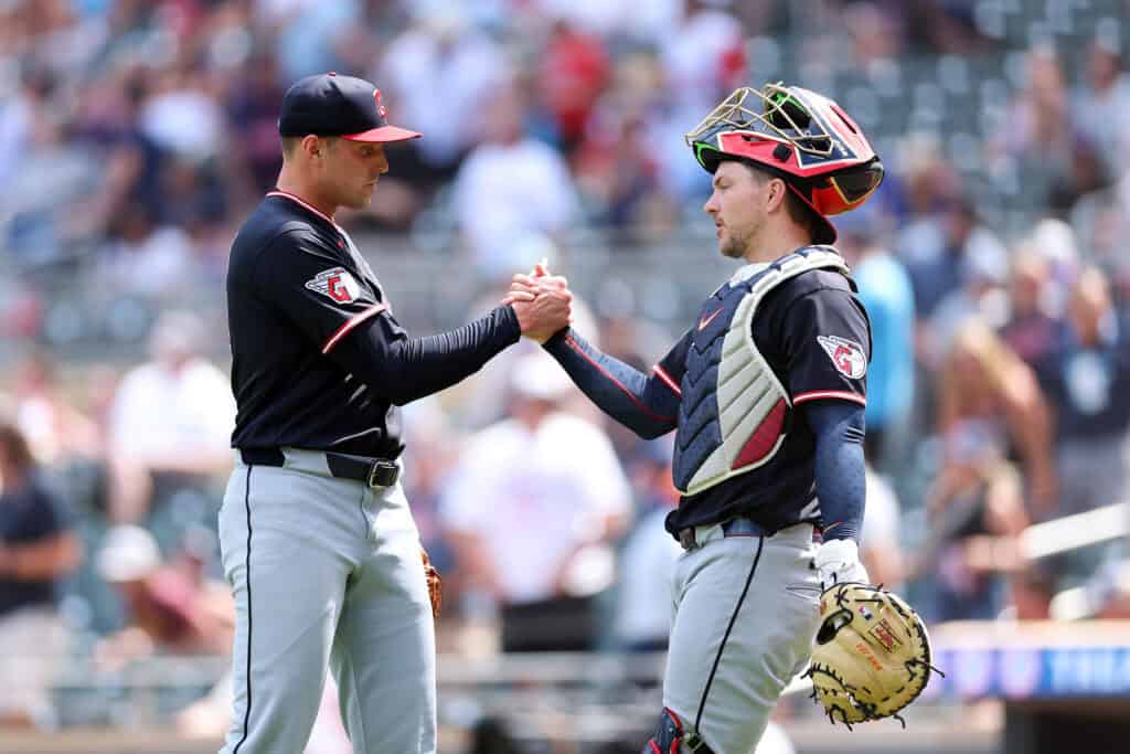 MINNEAPOLIS, MINNESOTA - JULY 09: Cade Smith #36 (L) and Patrick Bailey #16 of the Cleveland Guardians celebrate the win against the Minnesota Twins after the game at Target Field on July 09, 2026 in Minneapolis, Minnesota. The Guardians defeated the Twins 5-2.