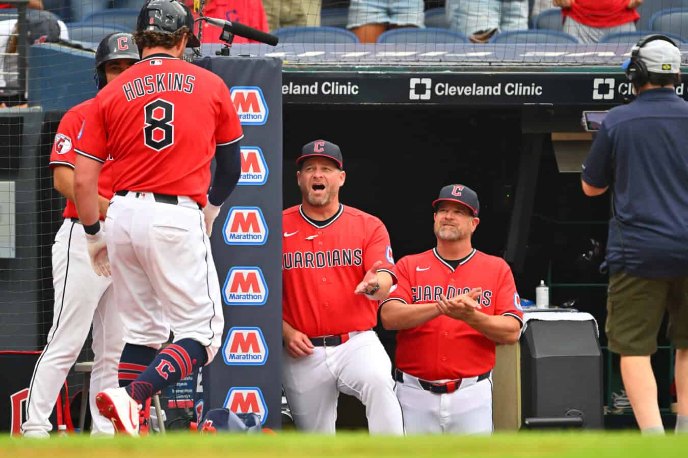 CLEVELAND, OHIO - JULY 20: Rhys Hoskins #8 of the Cleveland Guardians celebrates with manager Stephen Vogt during the third inning against the Minnesota Twins at Progressive Field on July 20, 2026 in Cleveland, Ohio.