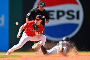 CLEVELAND, OHIO - JULY 23: Second baseman Travis Bazzana #37 of the Cleveland Guardians waits for the throw as Royce Lewis #23 of the Minnesota Twins steals second during the eighth inning at Progressive Field on July 23, 2026 in Cleveland, Ohio.