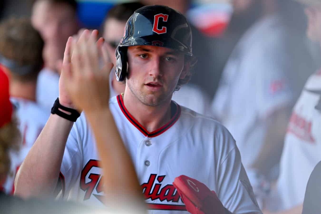 CLEVELAND, OHIO - JULY 01: Chase DeLauter #24 of the Cleveland Guardians celebrates after scoring during the seventh inning against the Texas Rangers at Progressive Field on July 01, 2026 in Cleveland, Ohio.