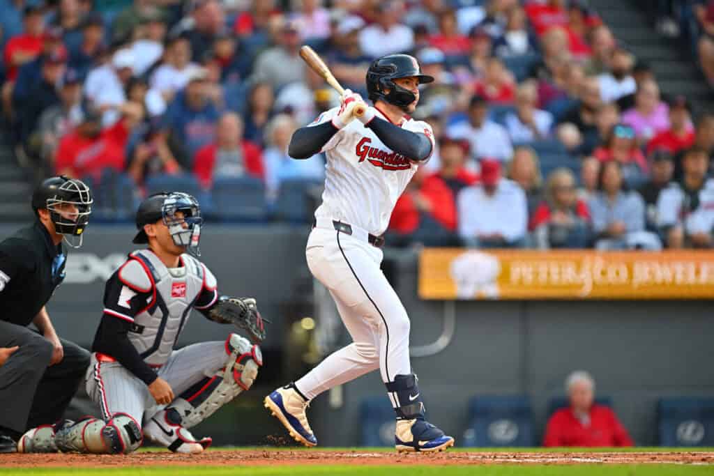 CLEVELAND, OHIO - JULY 22: Patrick Bailey #16 of the Cleveland Guardians hits an RBI single during the second inning against the Minnesota Twins at Progressive Field on July 22, 2026 in Cleveland, Ohio.