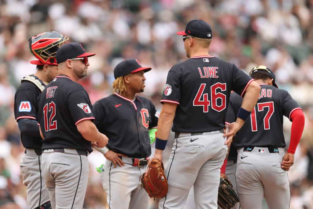 CHICAGO, ILLINOIS - AUGUST 09: Manager Stephen Vogt #12 of the Cleveland Guardians looks on during a pitching change against the Chicago White Sox at Rate Field on August 09, 2026 in Chicago, Illinois.