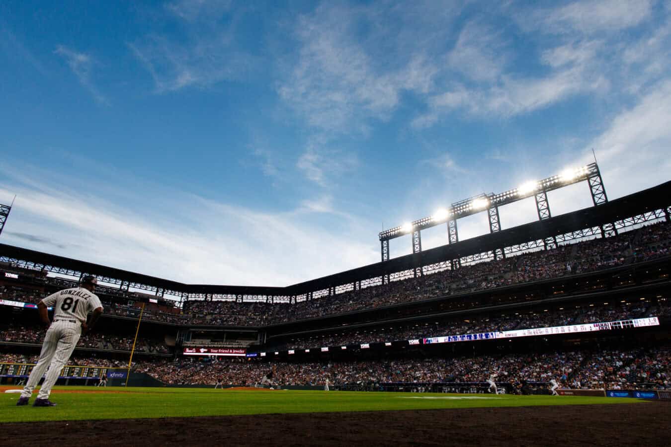 DENVER, CO - AUGUST 22: A general view of the stadium as starting pitcher Tanner Bibee #28 of the Cleveland Guardians delivers a pitch to TJ Rumfield #7 of the Colorado Rockies in the fourth inning at Coors Field on August 22, 2026