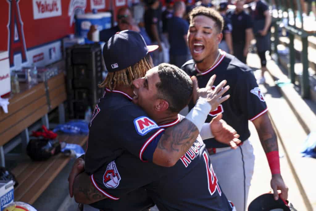 ANAHEIM, CALIFORNIA - AUGUST 26: José Ramírez #11, Brayan Rocchio #4 and Angel Genao #17 of the Cleveland Guardians celebrate a 4-3 win over the Los Angeles Angels at Angel Stadium of Anaheim on August 26, 2026 in Anaheim, California.
