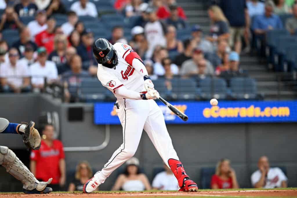 CLEVELAND, OHIO - AUGUST 04: Jo Adell #7 of the Cleveland Guardians hits a single during the first inning against the New York Mets at Progressive Field on August 04, 2026 in Cleveland, Ohio.