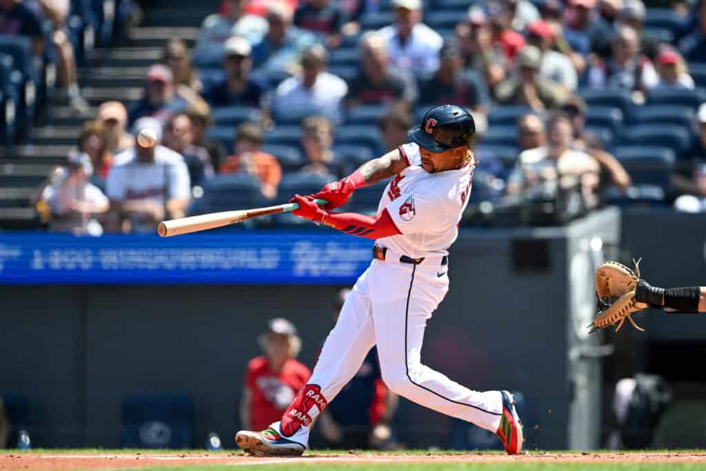 CLEVELAND, OHIO - AUGUST 20: José RamÃrez #11 of the Cleveland Guardians hits an RBI single during the first inning against the San Francisco Giants at Progressive Field on August 20, 2026 in Cleveland, Ohio.