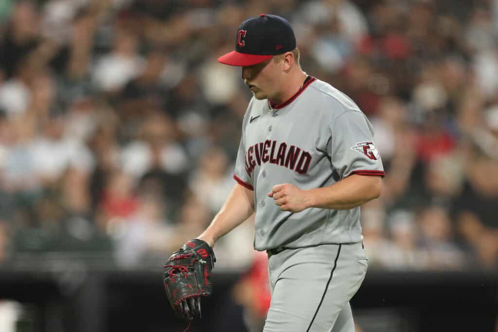 CHICAGO, ILLINOIS - AUGUST 07: Parker Messick #77 of the Cleveland Guardians celebrates a out against the Chicago White Sox at Rate Field on August 07, 2026 in Chicago, Illinois.