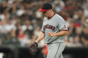CHICAGO, ILLINOIS - AUGUST 07: Parker Messick #77 of the Cleveland Guardians celebrates a out against the Chicago White Sox at Rate Field on August 07, 2026 in Chicago, Illinois.