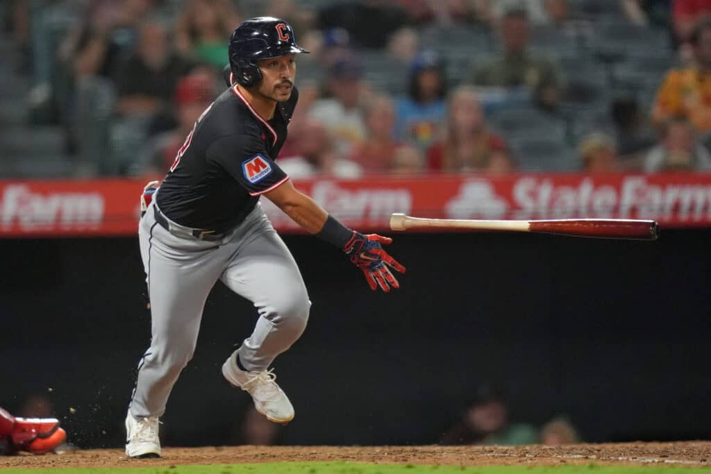 ANAHEIM, CALIFORNIA - AUGUST 25: Steven Kwan #38 of the Cleveland Guardians hits an RBI single against the Los Angeles Angels during the fifth inning at Angel Stadium of Anaheim on August 25, 2026 in Anaheim, California.