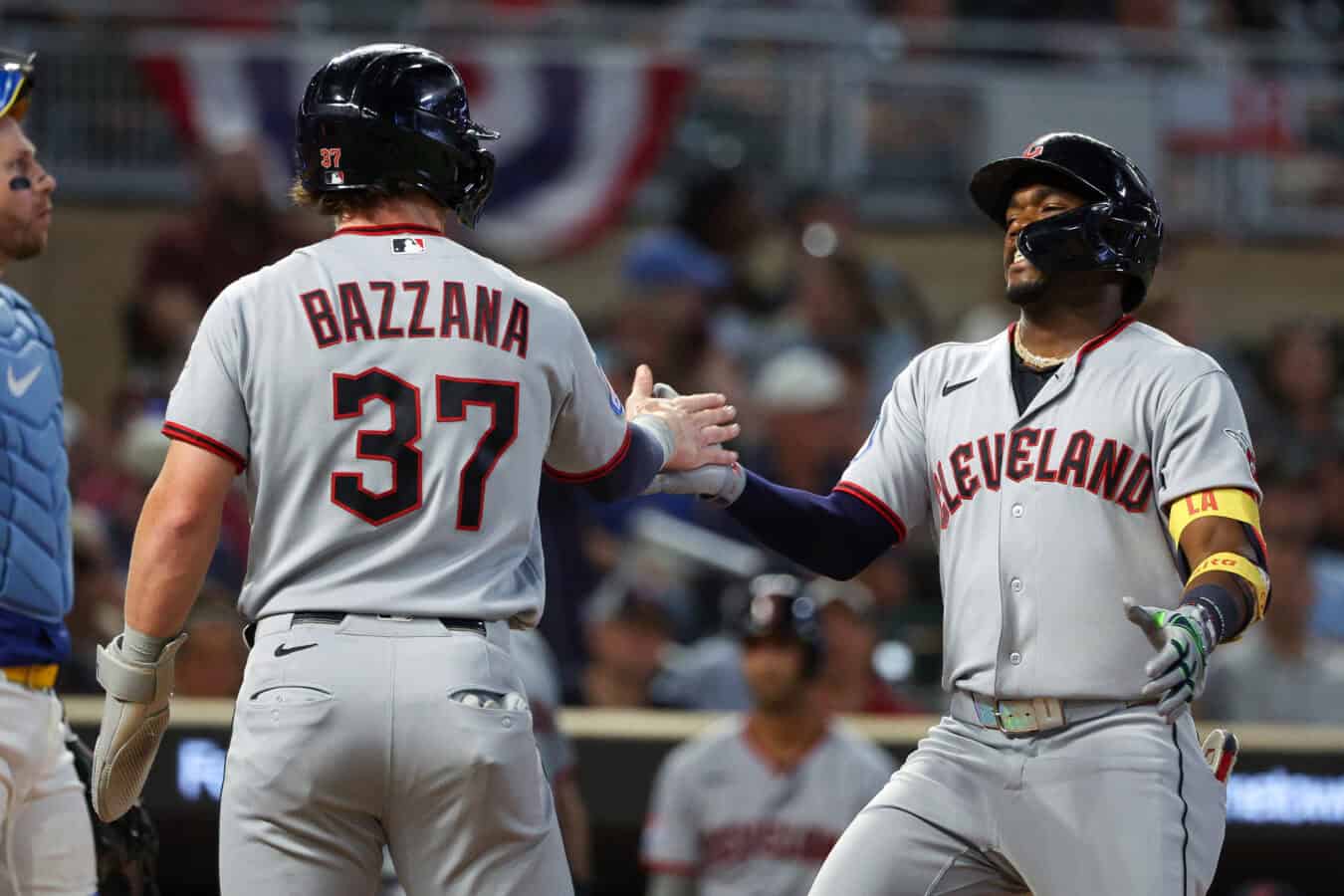 MINNEAPOLIS, MINNESOTA - SEPTEMBER 11: Angel Martínez #1 of the Cleveland Guardians celebrates his his solo home run with Travis Bazzana #37 during the seventh inning against the Minnesota Twins at Target Field on September 11, 2026 in Minneapolis, Minnesota.