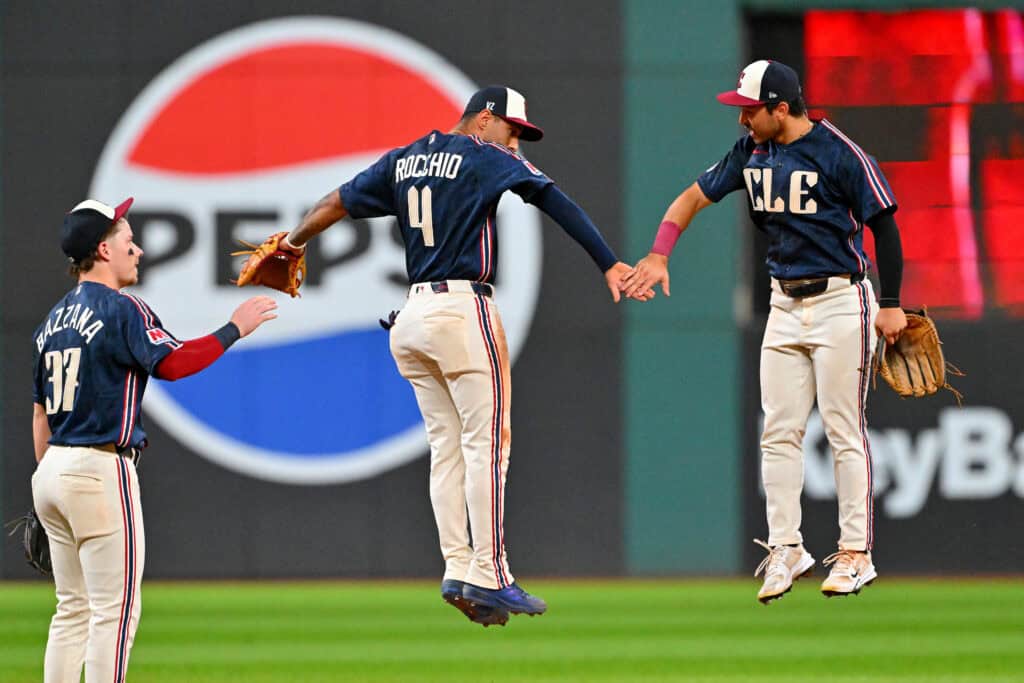 CLEVELAND, OHIO - SEPTEMBER 18: Brayan Rocchio #4 celebrates with Steven Kwan #38 of the Cleveland Guardians after the game against the Athletics at Progressive Field on September 18, 2026 in Cleveland, Ohio. The Guardians defeated the Athletics 5-3.