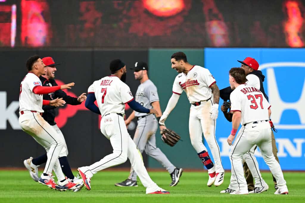 CLEVELAND, OHIO - SEPTEMBER 15: Brayan Rocchio #4 of the Cleveland Guardians celebrates with teammates after hitting a walk-off two-run double to defeat the Chicago White Sox 7-6 at Progressive Field on September 15, 2026 in Cleveland, Ohio.