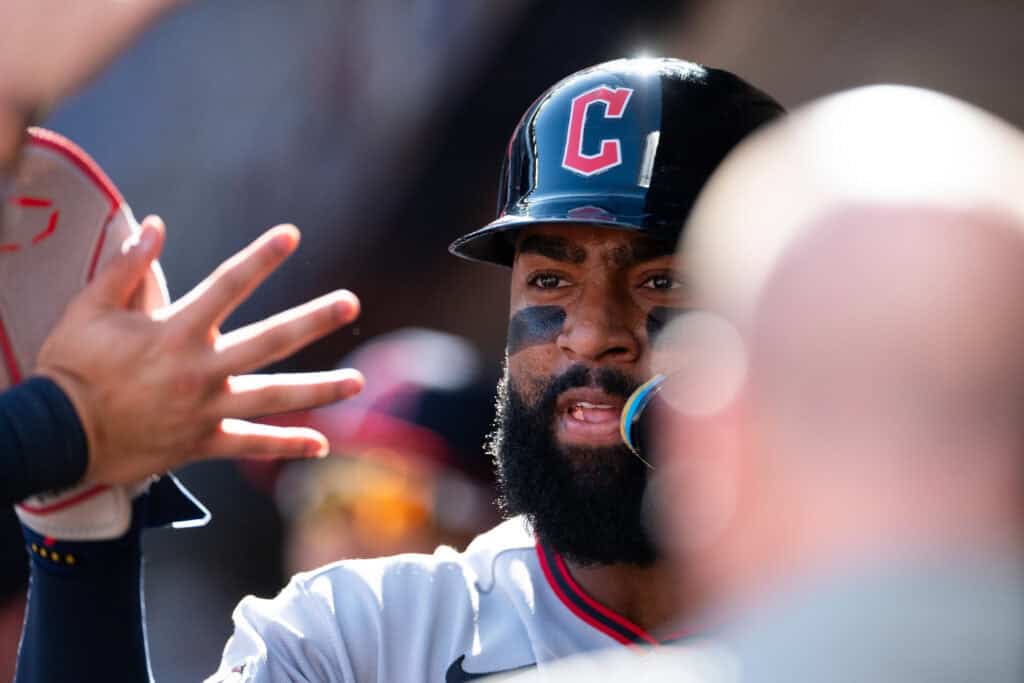 MINNEAPOLIS, MINNESOTA - SEPTEMBER 12: Jo Adell #7 of the Cleveland Guardians celebrates after scoring against the Minnesota Twins during the second inning of the game at Target Field on September 12, 2026 in Minneapolis, Minnesota.