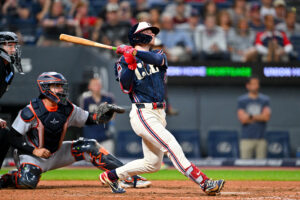 CLEVELAND, OHIO - SEPTEMBER 04: Travis Bazzana #37 of the Cleveland Guardians hits a two-run homer during the eighth inning of the second game of a doubleheader against the Detroit Tigers at Progressive Field on September 04, 2026, in Cleveland, Ohio.