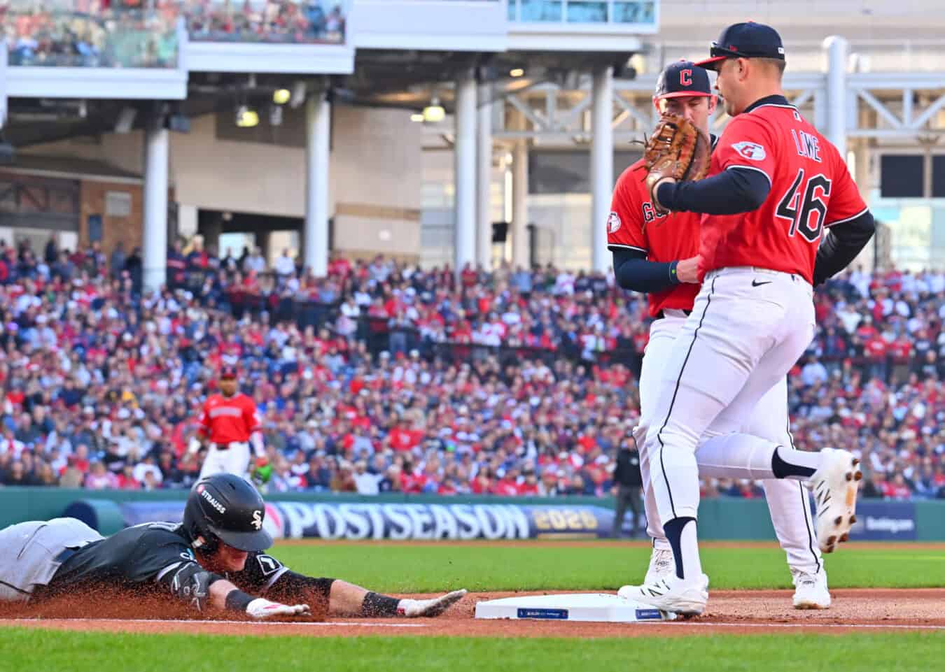 CLEVELAND, OHIO - OCTOBER 05: Nathaniel Lowe #46 of the Cleveland Guardians runs to first base for an out during the first inning against the Sam Antonacci #17 of the Chicago White Sox in game two of the American League Division Series at Progressive Field on October 05, 2026 in Cleveland, Ohio.