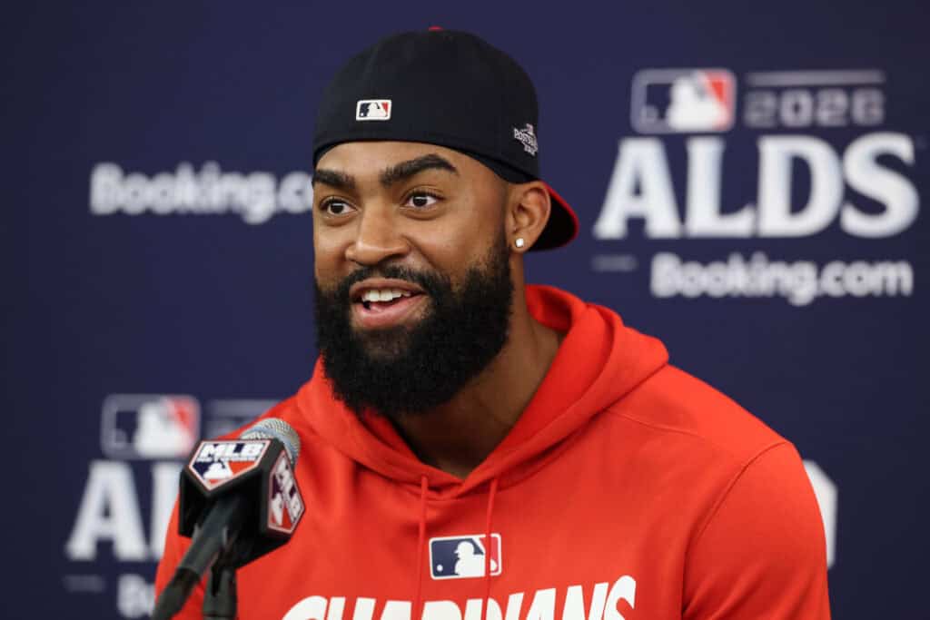 CHICAGO, ILLINOIS - OCTOBER 08: Jo Adell #7 of the Cleveland Guardians speaks to the media prior to game four of the American League Division Series against the Chicago White Sox at Rate Field on October 08, 2026 in Chicago, Illinois.
