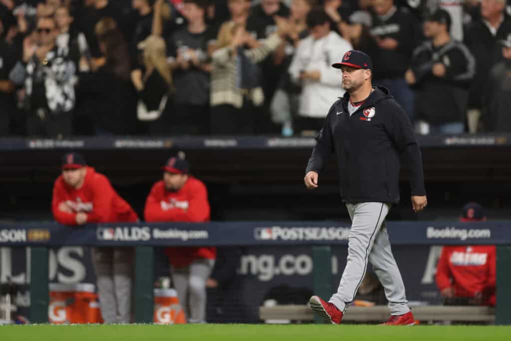 CHICAGO, ILLINOIS - OCTOBER 08: Manager Stephen Vogt #12 of the Cleveland Guardians walks to the pitching mound against the Chicago White Sox during the third inning in game four of the American League Division Series at Rate Field on October 08, 2026 in Chicago, Illinois.