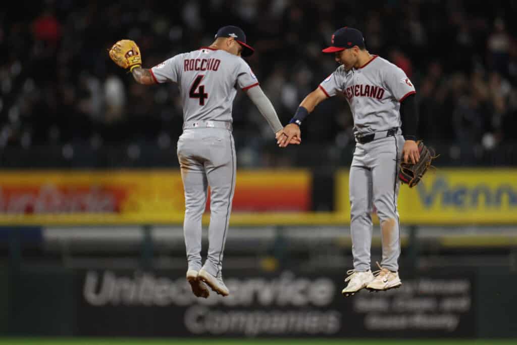 CHICAGO, ILLINOIS - OCTOBER 08: Steven Kwan #38 of the Cleveland Guardians celebrates with Brayan Rocchio #4 of the Cleveland Guardians after defeating the Chicago White Sox in game four of the American League Division Series at Rate Field on October 08, 2026 in Chicago, Illinois.