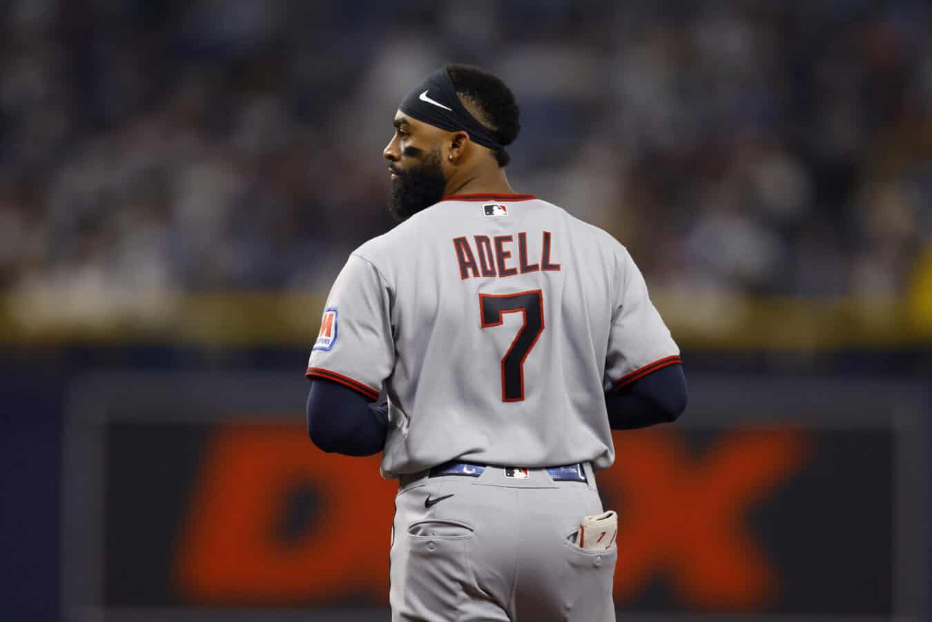 ST PETERSBURG, FLORIDA - OCTOBER 13: Jo Adell #7 of the Cleveland Guardians looks on against the Tampa Bay Rays during the first inning in game two of the American League Championship Series at Tropicana Field on October 13, 2026 in St Petersburg, Florida.
