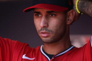 CLEVELAND, OHIO - OCTOBER 15: Brayan Rocchio #4 of the Cleveland Guardians looks on from the dugout prior to game three of the American League Championship Series against the Tampa Bay Rays at Progressive Field on October 15, 2026 in Cleveland, Ohio.