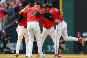 CLEVELAND, OHIO - OCTOBER 15: José Ramírez #11, Nathaniel Lowe #46, Brayan Rocchio #4, and Angel Genao #17 of the Cleveland Guardians celebrate after defeating the Tampa Bay Rays 3-2 in game three of the American League Championship Series at Progressive Field on October 15, 2026 in Cleveland, Ohio.
