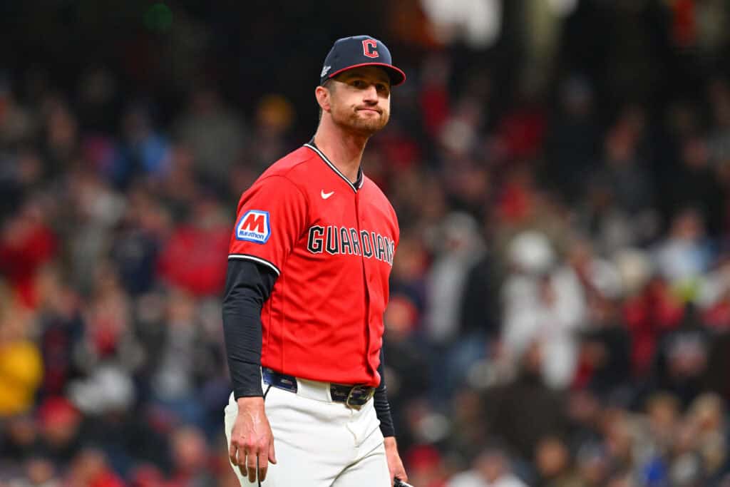 CLEVELAND, OHIO - OCTOBER 17: Foster Griffin #22 and Patrick Bailey #16 of the Cleveland Guardians reacts while walking off the mound during the fifth inning against the Tampa Bay Rays in game four of the American League Championship Series at Progressive Field on October 17, 2026 in Cleveland, Ohio.