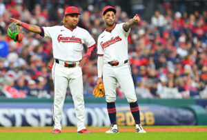 CLEVELAND, OHIO - OCTOBER 18: Jose Ramirez #11 and Brayan Rocchio #4 of the Cleveland Guardians talk during the pitching change during the fifth inning against the Tampa Bay Rays in game five of the American League Championship Series at Progressive Field on October 18, 2026 in Cleveland, Ohio.