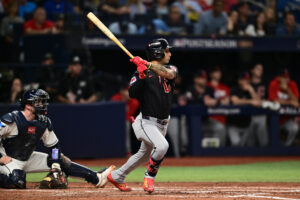 ST PETERSBURG, FLORIDA - OCTOBER 19: Brayan Rocchio #4 of the Cleveland Guardians hits a single during the third inning against the Tampa Bay Rays in game six of the American League Championship Series at Tropicana Field on October 19, 2026 in St Petersburg, Florida.