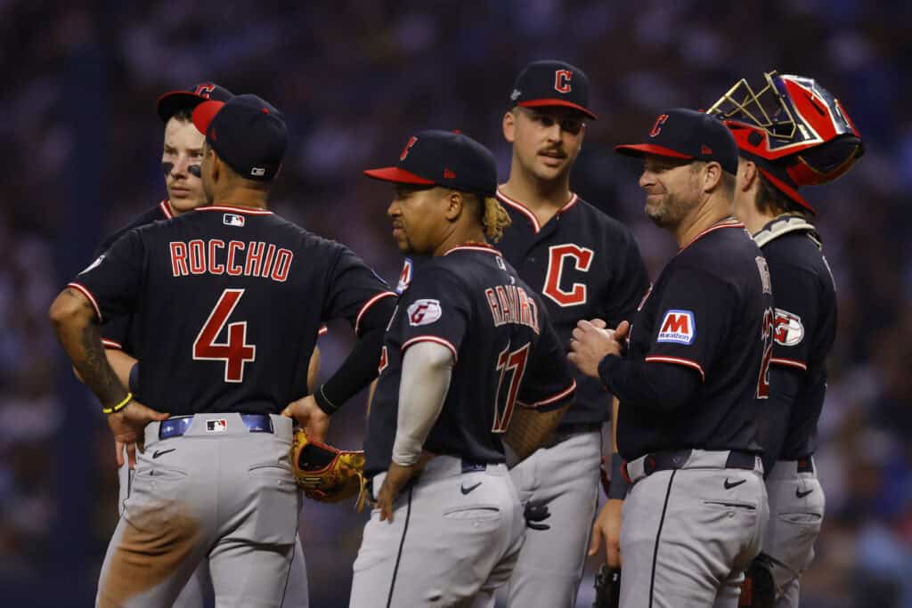ST PETERSBURG, FLORIDA - OCTOBER 19: Manager Stephen Vogt #12 of the Cleveland Guardians speaks to this team on the pitching mound during the fourth inning against the Tampa Bay Rays in game six of the American League Championship Series at Tropicana Field on October 19, 2026 in St Petersburg, Florida.