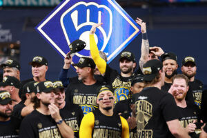 ST PETERSBURG, FLORIDA - OCTOBER 28: Garrett Mitchell #5 of the Milwaukee Brewers celebrates during the Awards Ceremony after defeating the Tampa Bay Rays in the 2026 World Series at Tropicana Field on October 28, 2026 in St Petersburg, Florida.
