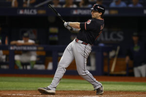ST PETERSBURG, FLORIDA - OCTOBER 19: Chase DeLauter #24 of the Cleveland Guardians hits a double during the sixth inning against the Tampa Bay Rays in game six of the American League Championship Series at Tropicana Field on October 19, 2026 in St Petersburg, Florida.