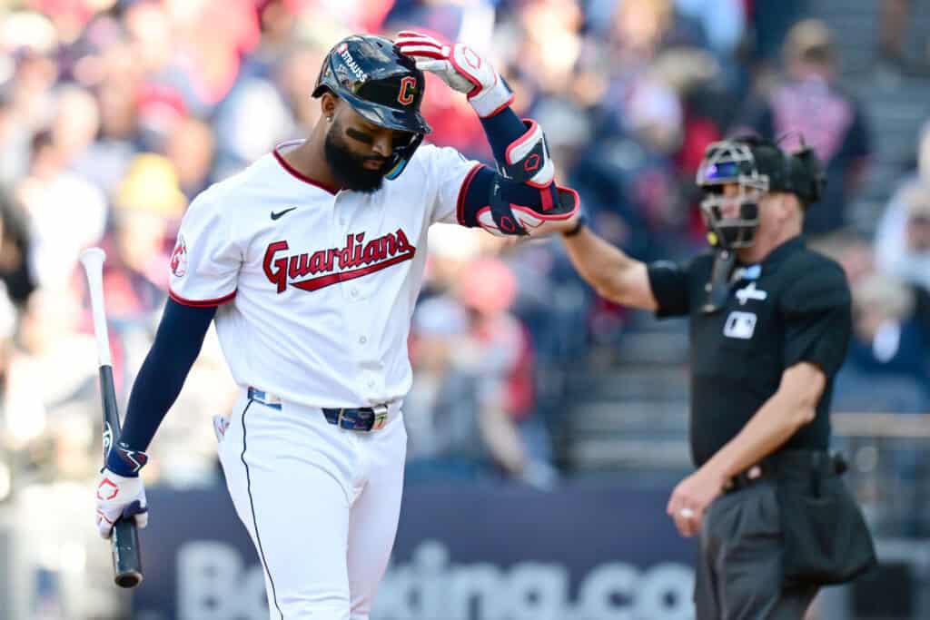 CLEVELAND, OHIO - OCTOBER 03: Jo Adell #7 of the Cleveland Guardians reacts to striking out against the Chicago White Sox during the eighth inning in game one of the American League Division Series at Progressive Field on October 03, 2026 in Cleveland, Ohio.